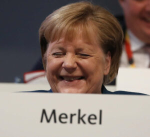 Zu Beginn war Merkel die einzige Frau unter den Mächtigen der EU.