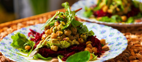 Fresh vegeterian salad on the plates