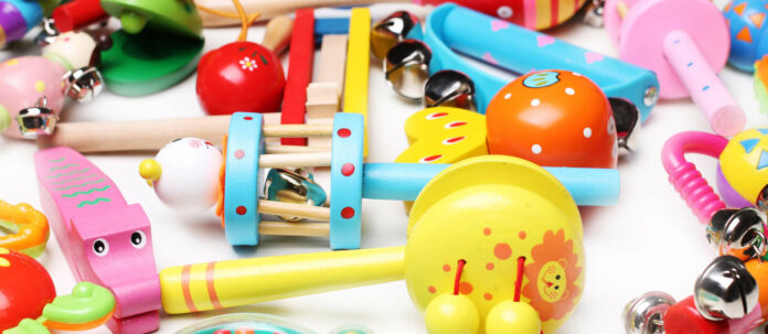 different rattles for babies background