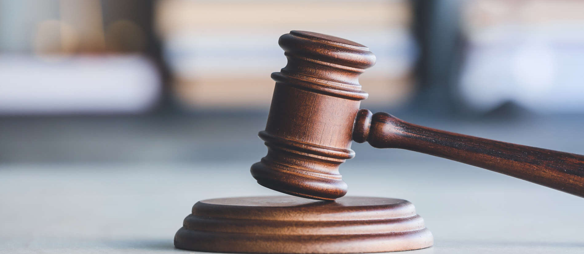 Judge's gavel on table in office