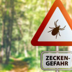 warning sign with text ZECKEN GEFAHR, German for beware of t